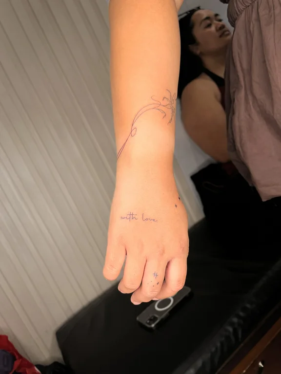 abstract fine line hand thin line wave minimal elegant bold line tattoo Canggu Bali