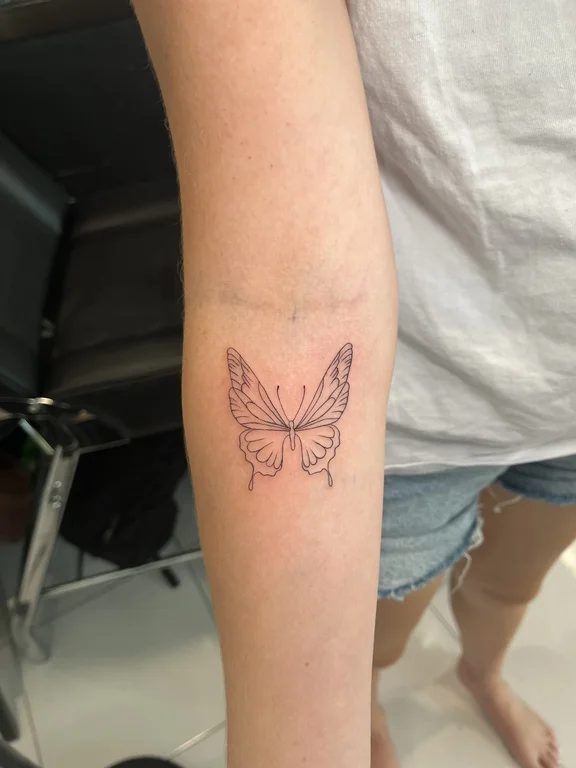 symbol minimalist butterfly soft shading minimal fine line linework dotwork tattoo Canggu Bali