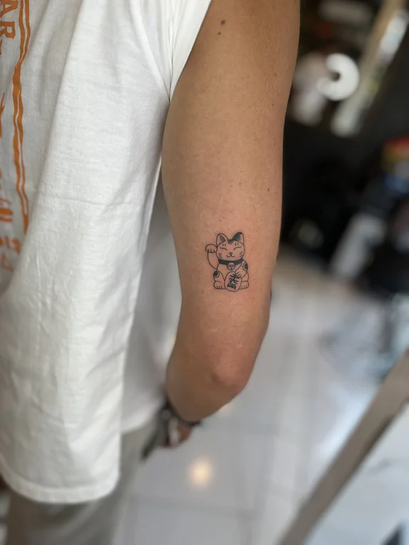 animal fine line lion soft shading minimal cloud linework elegant tattoo Canggu Bali