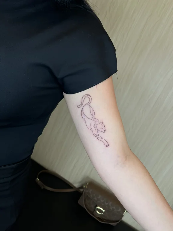 symbol fine line snake bold line elegant woman linework soft shading tattoo Canggu Bali