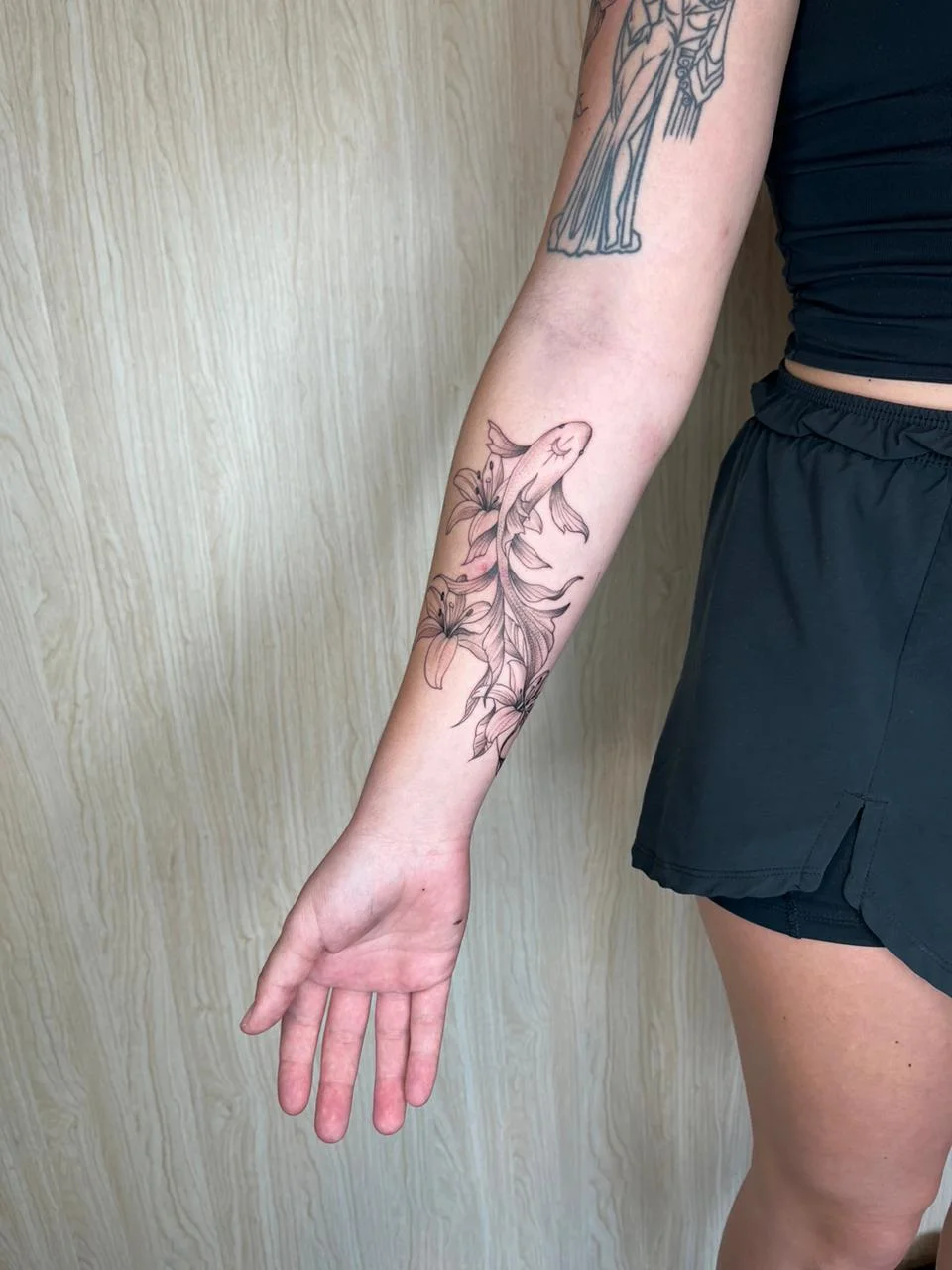 woman hand koi animal flower fine line fineline linework line tattoo canggu bali