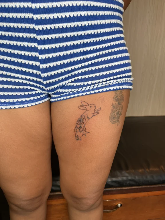 animal fine line woman linework wave thin line cloud snake tattoo Canggu Bali