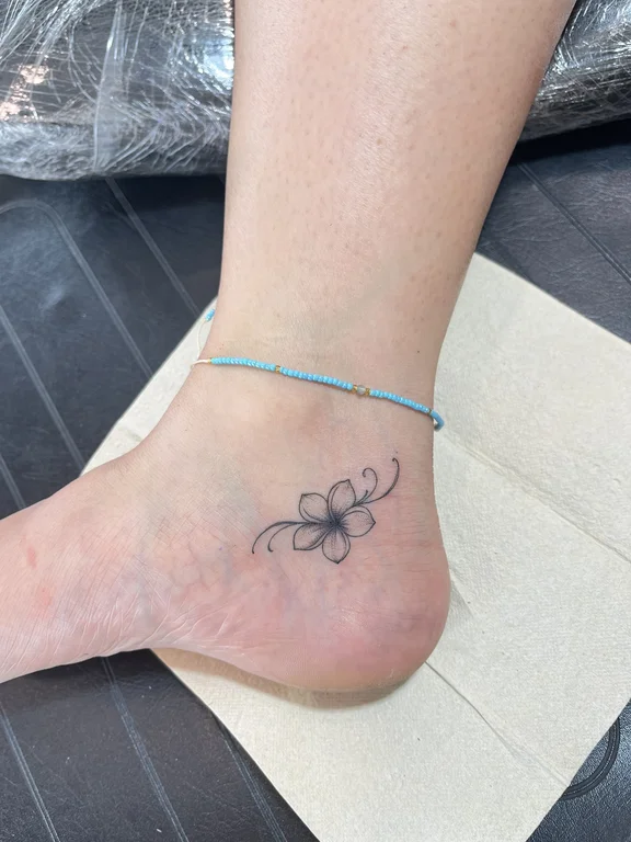 symbol fine line butterfly thin line flower bold line linework minimal tattoo Canggu Bali