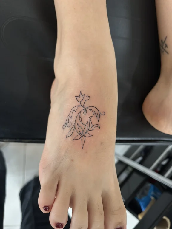 animal fine line hand linework elegant soft shading minimal flower tattoo Canggu Bali