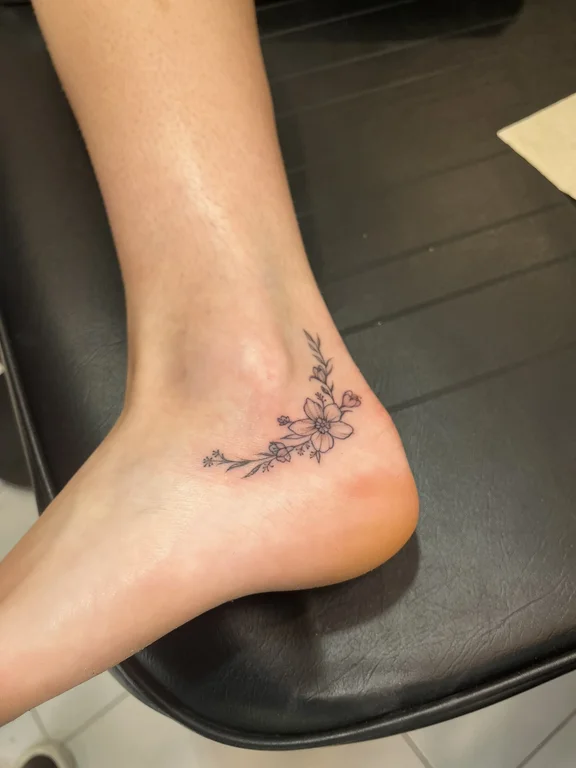 floral fine line koi soft shading elegant linework flower dotwork tattoo Canggu Bali