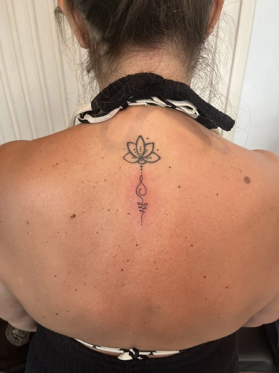 mandala blackwork lotus dotwork spiritual fine line elegant linework tattoo Canggu Bali