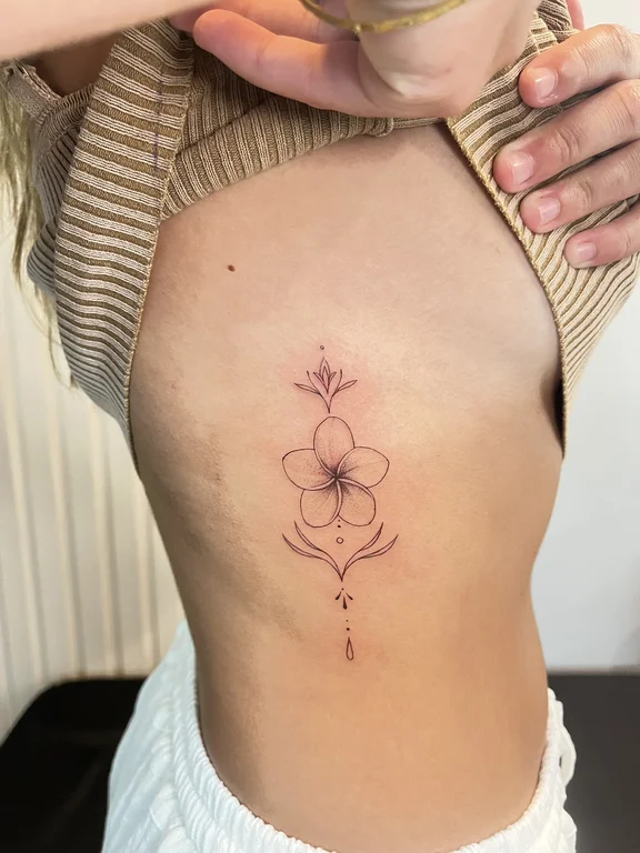 floral fine line lotus linework elegant dotwork soft shading spiritual tattoo Canggu Bali