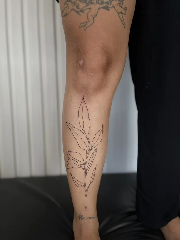 floral fine line lotus linework leaf elegant minimal dotwork tattoo Canggu Bali