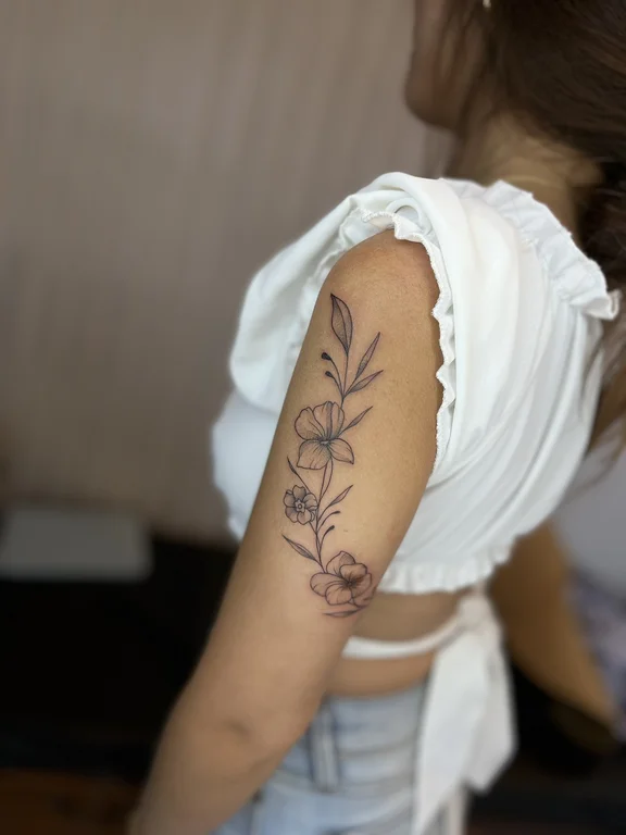 floral fine line peony linework elegant minimal soft shading leaf tattoo Canggu Bali