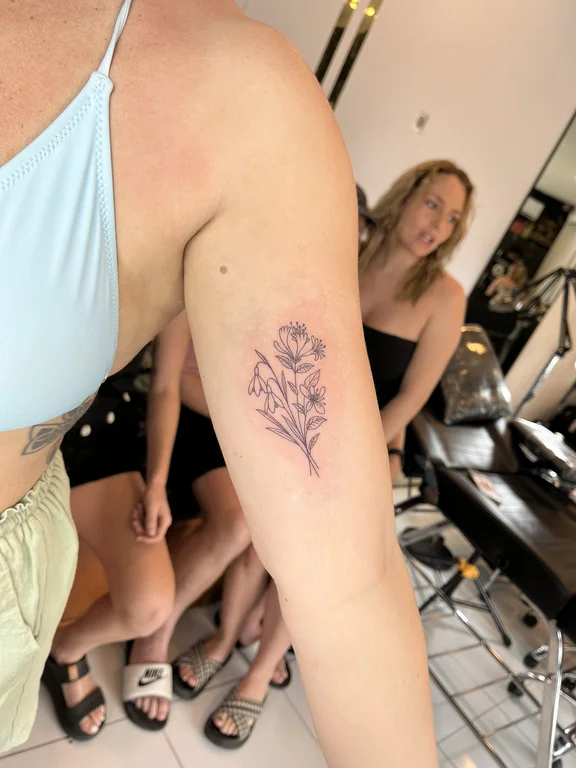 floral fine line peony linework elegant soft shading rose dotwork tattoo Canggu Bali