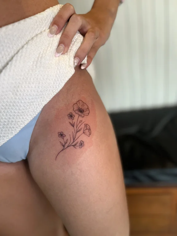 floral fine line rose soft shading elegant linework minimal peony tattoo Canggu Bali