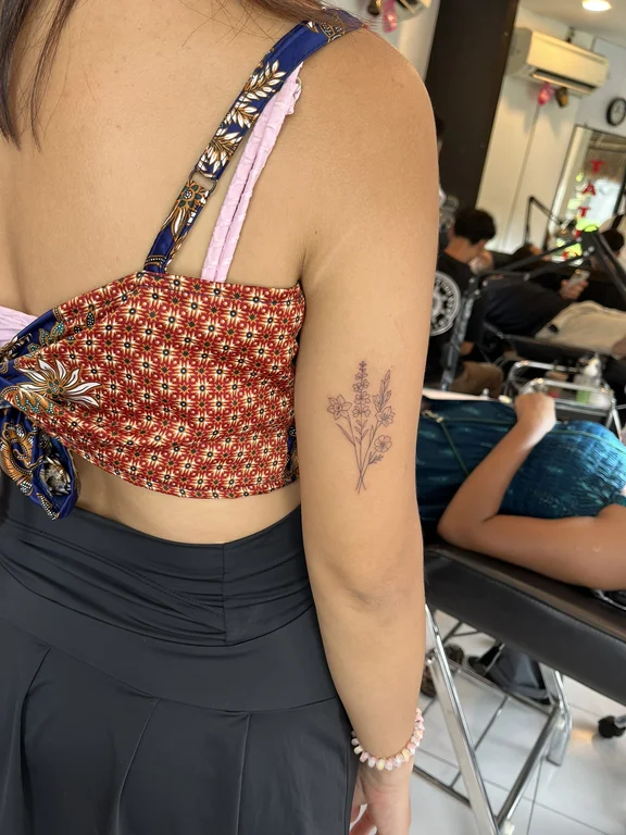 geometric traditional woman balinese pattern elegant linework dotwork fine line tattoo Canggu Bali