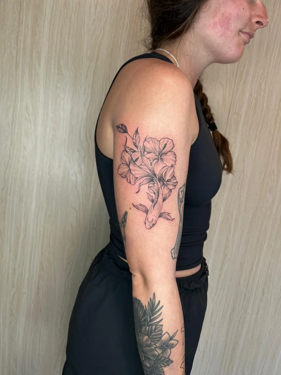 woman hand flower fine line fineline linework line koi fish tattoo canggu bali