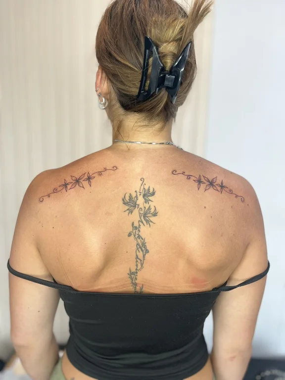 floral fine line woman linework elegant dotwork flower bold line tattoo Canggu Bali