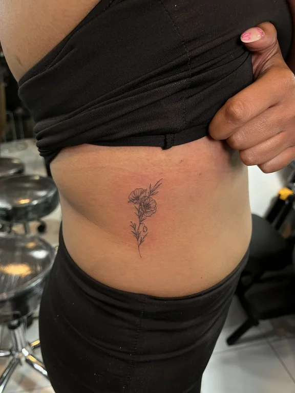 abstract blackwork woman linework elegant fine line dotwork soft shading tattoo Canggu Bali