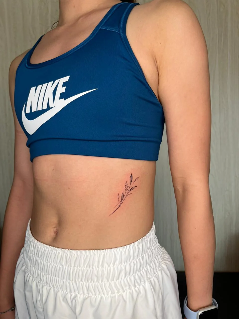 woman waist flower fine line line work line minimalist simple tattoo canggu bali