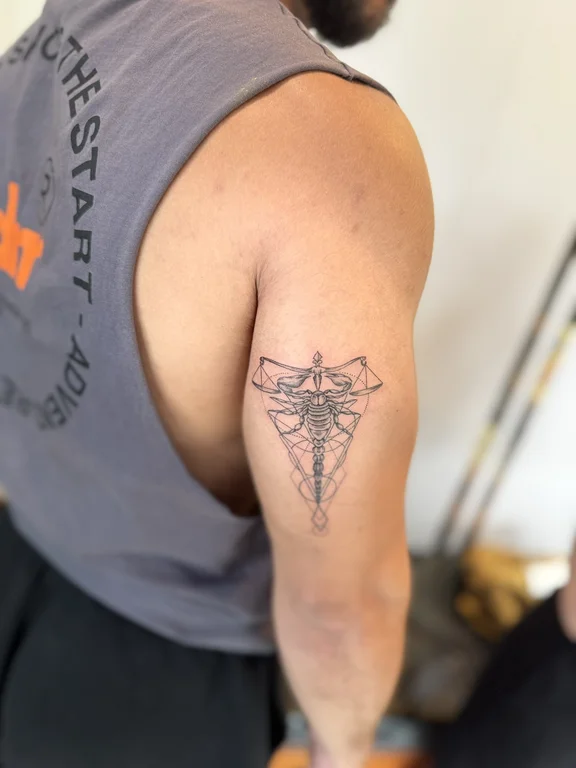 geometric fine line deity linework spiritual dotwork bold line sacred geometry tattoo Canggu Bali