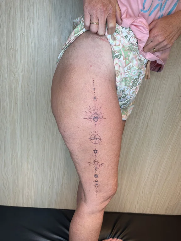 abstract fine line deity linework spiritual dotwork soft shading sun tattoo Canggu Bali