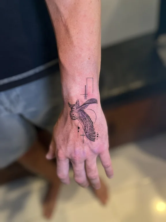 religious fine line hand linework spiritual bold line dotwork minimal tattoo Canggu Bali