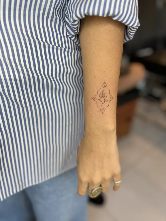 geometric fine line woman dotwork minimal elegant linework bold line tattoo Canggu Bali