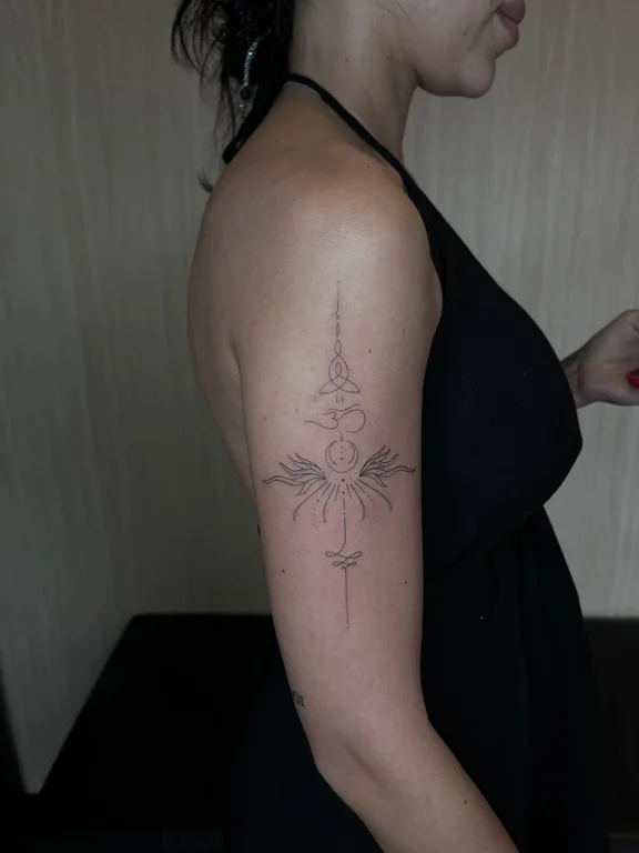 religious blackwork woman linework spiritual fine line dotwork elegant tattoo Canggu Bali