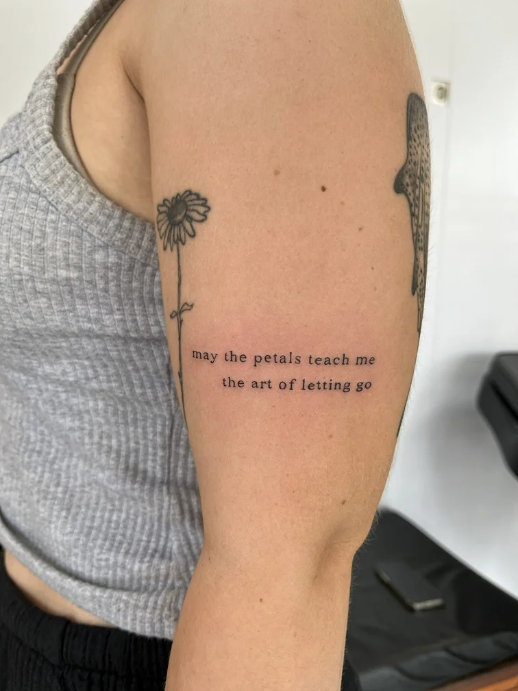 woman hand lettering fine line line work line simple tattoo canggu bali