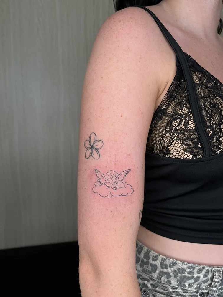 fineline linework line cupid tattoo cute black woman hand tattoo canggu bali