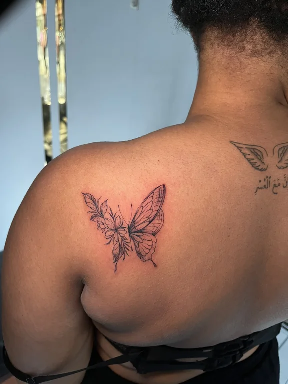 nature fine line butterfly soft shading flower elegant linework leaf tattoo Canggu Bali