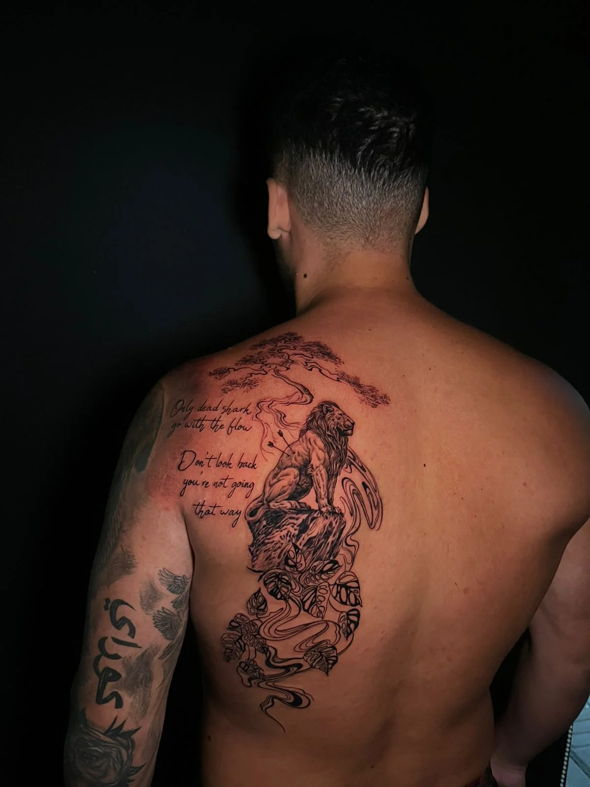 man back lion nature fine line line work line shading tattoo canggu bali