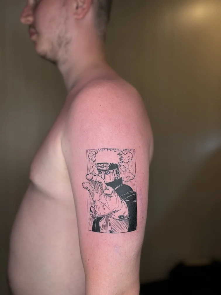 anime pain naruto man hand black fineline linework portrait tattoo tattoo canggu bali