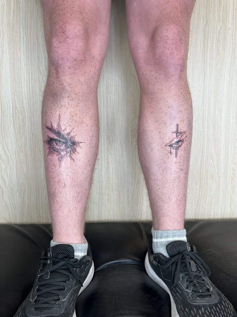 eye linework black grey shading man foot tattoo tattoo canggu bali