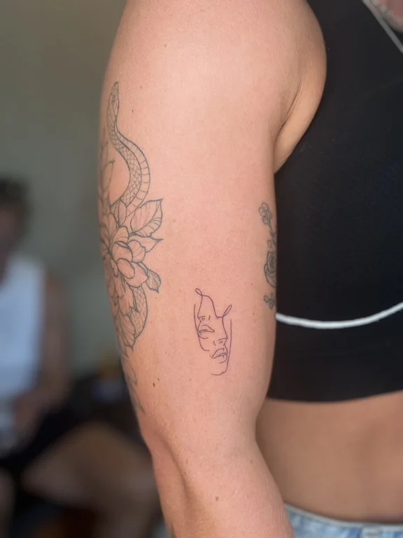 floral blackwork woman dotwork elegant linework fine line lotus tattoo Canggu Bali