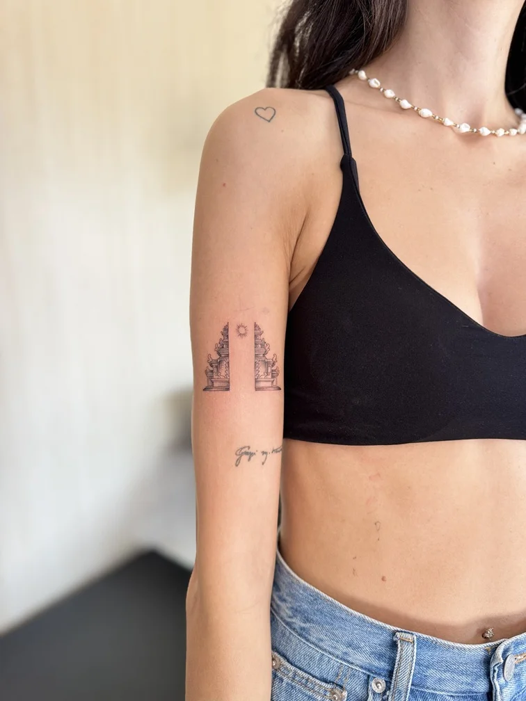 fineline line woman hand temple religius tattoo bali tattoo canggu bali