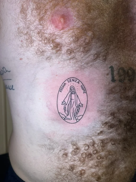 religious fine line man dotwork spiritual mystical soft shading angel tattoo Canggu Bali