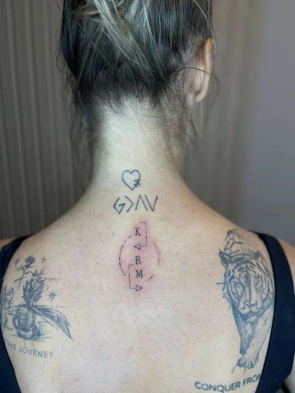 religious fine line woman dotwork spiritual bold line cloud soft shading tattoo Canggu Bali
