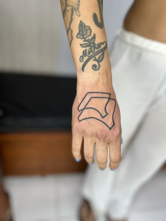 symbol fine line hand bold line wave linework thin line man tattoo Canggu Bali