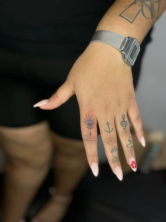 symbol fine line hand thin line elegant spiritual black grey colorful tattoo Canggu Bali