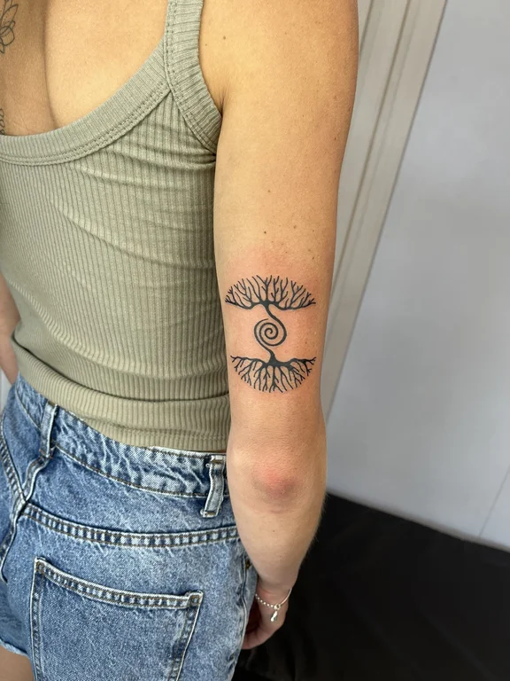 symbol fine line lotus linework sun minimal dotwork spiritual tattoo Canggu Bali