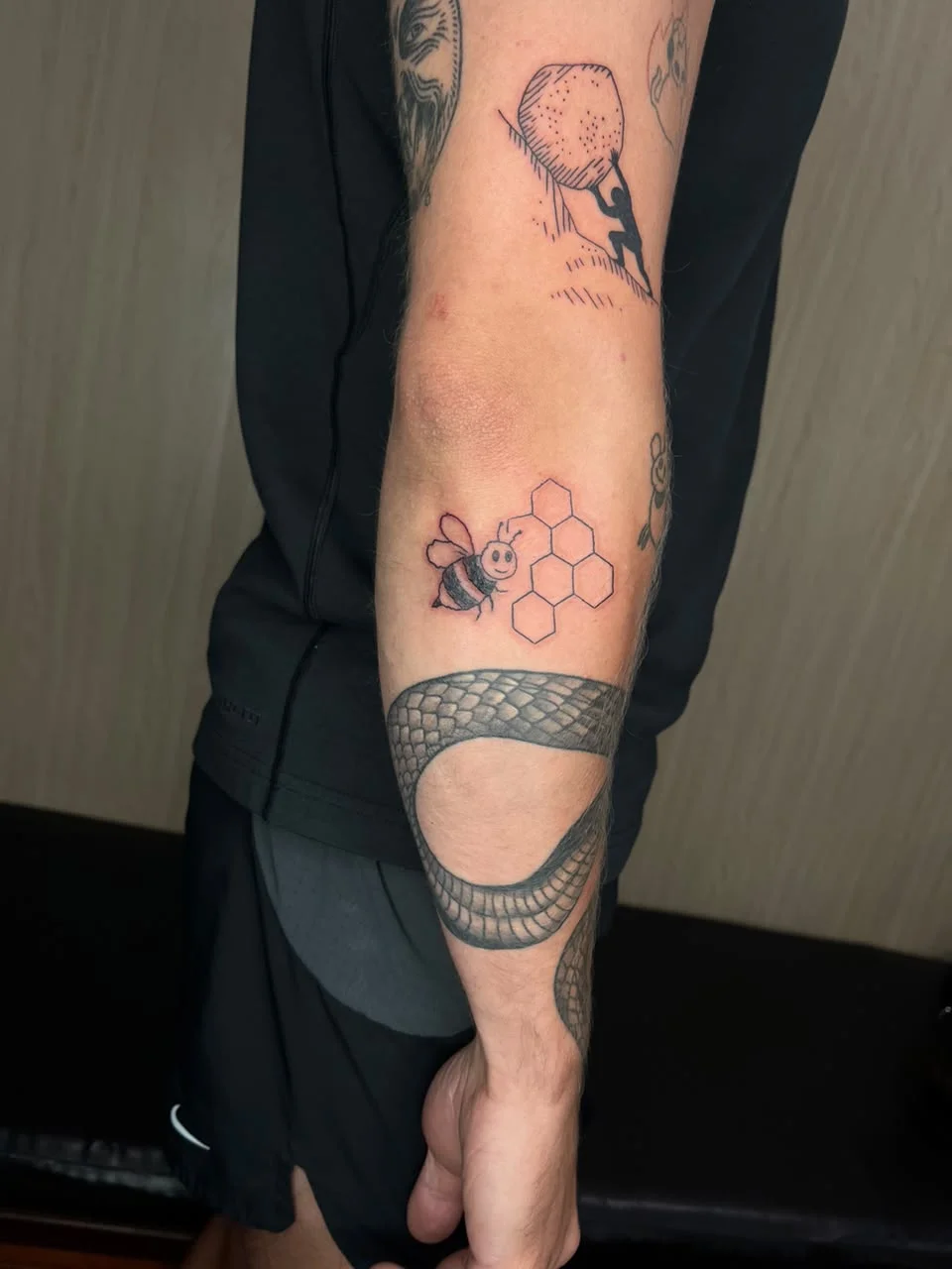 man hand bee honey symbol cartoon fine line line work line tattoo canggu bali