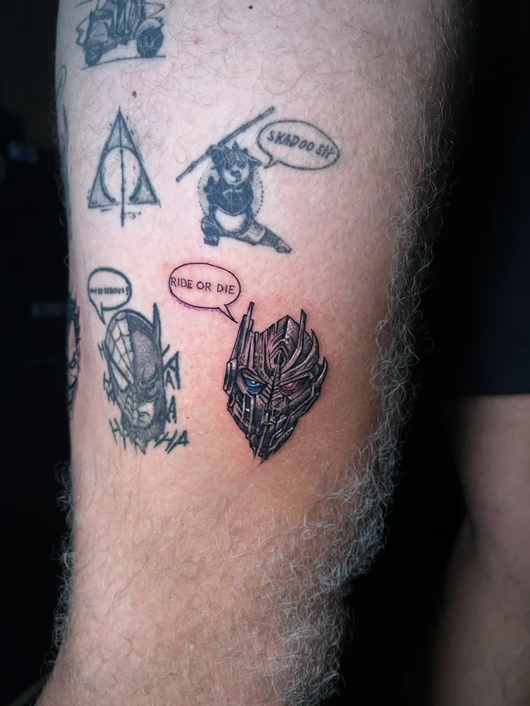 illustrative face black portrait transformer tattoo linework shading cartoon tattoo canggu bali