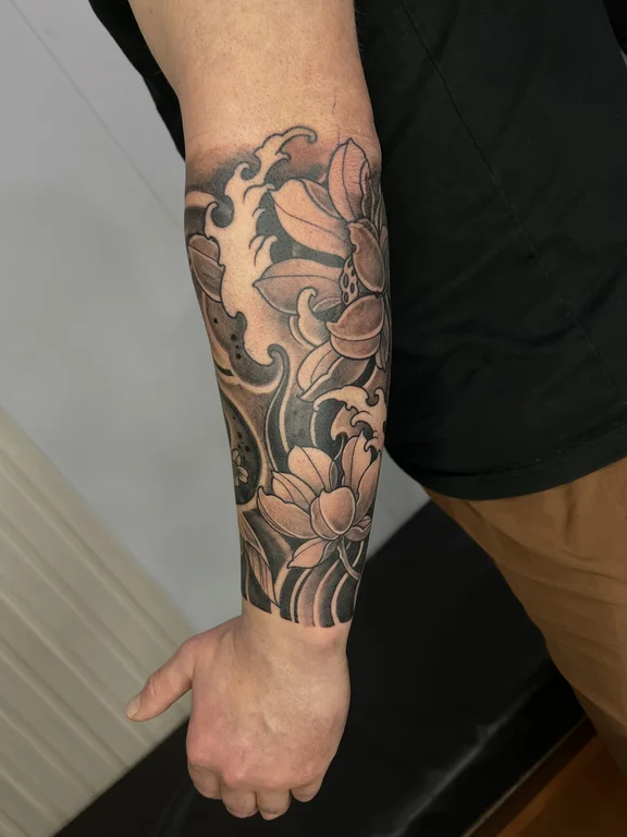 floral japanese peony heavy shading elegant linework black grey soft shading tattoo Canggu Bali