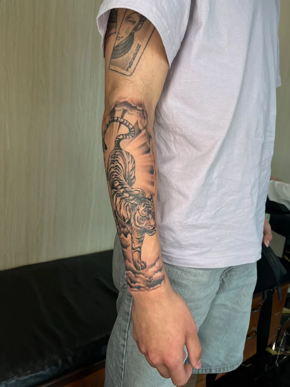 tiger black work shading japanese animal man hand half sleeve tattoo canggu bali