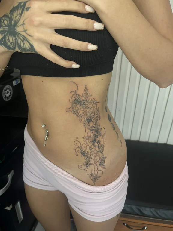 floral japanese peony linework elegant fine line soft shading dotwork tattoo Canggu Bali