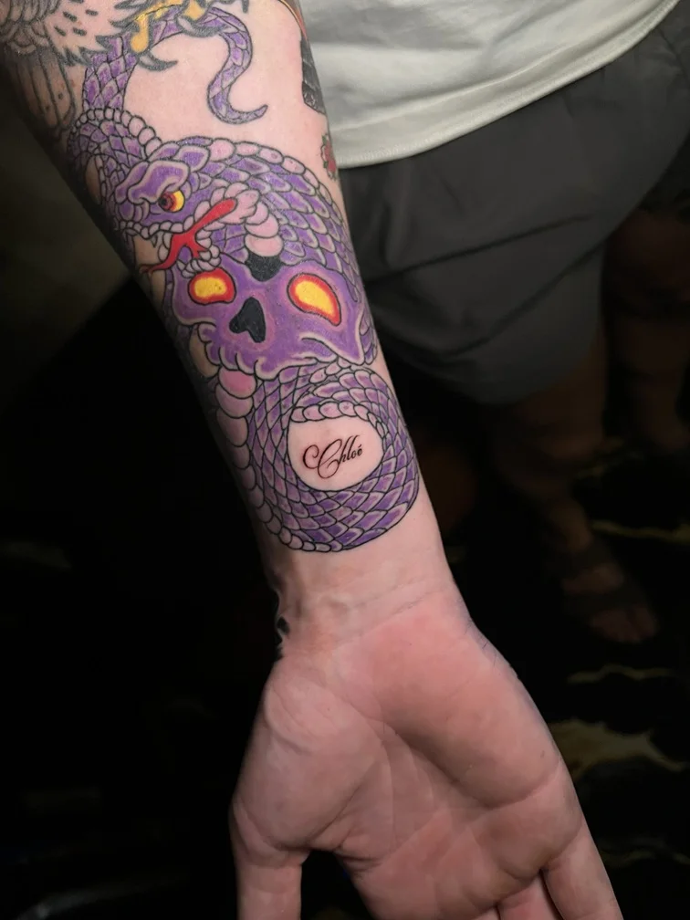 snake mythology japanese man hand purple tattoo color tattoo canggu bali