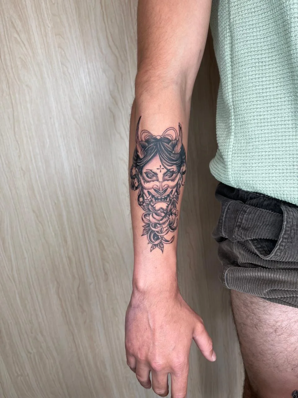 hannya man hand japanese ornamental girl mask blackwork tattoo canggu bali