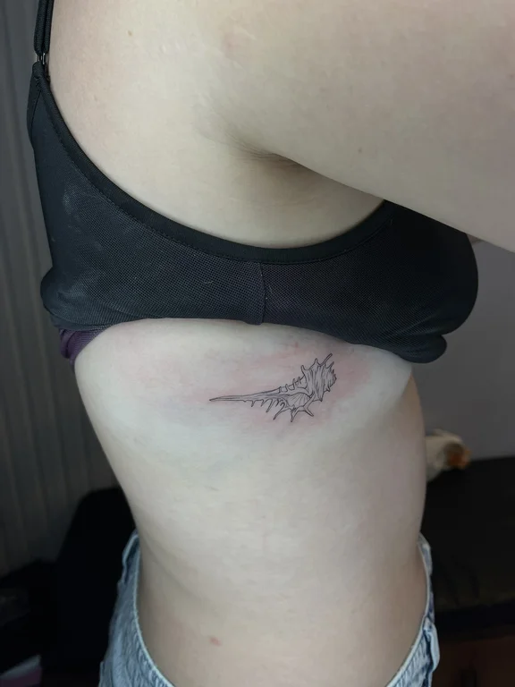 symbol blackwork angel fine line elegant minimal soft shading linework tattoo Canggu Bali