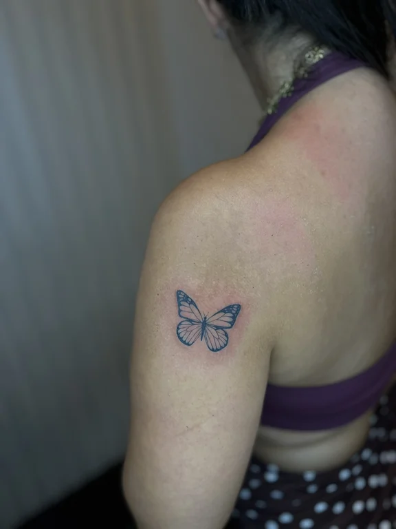 symbol minimalist butterfly soft shading elegant fine line dotwork black grey tattoo Canggu Bali