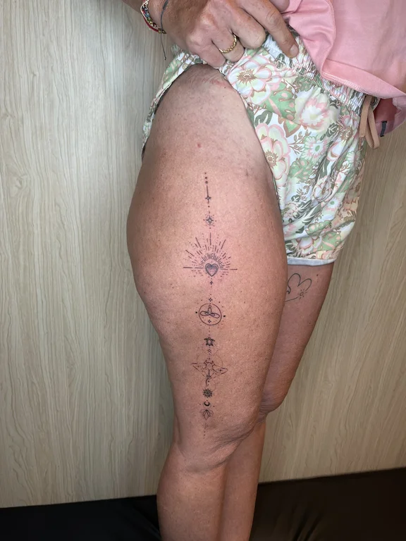 abstract traditional deity fine line sun dotwork linework sacred geometry tattoo Canggu Bali