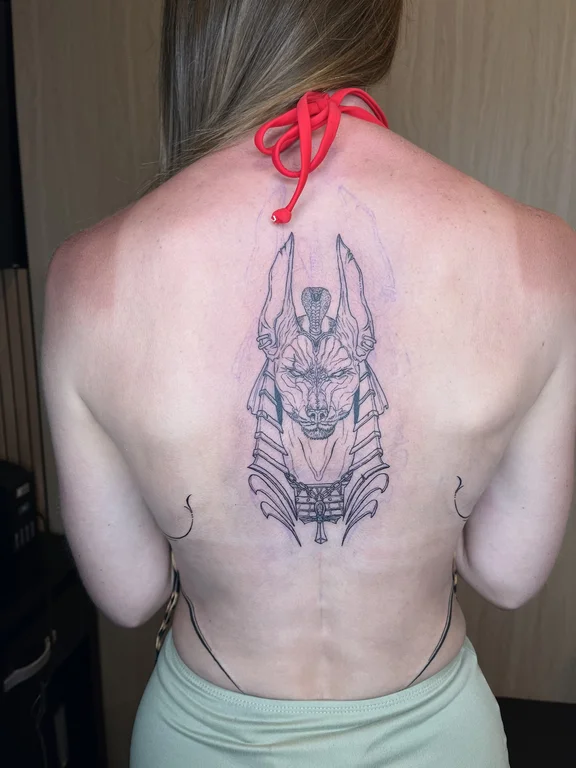 mythology linework demon fine line spiritual deity bold line mask tattoo Canggu Bali