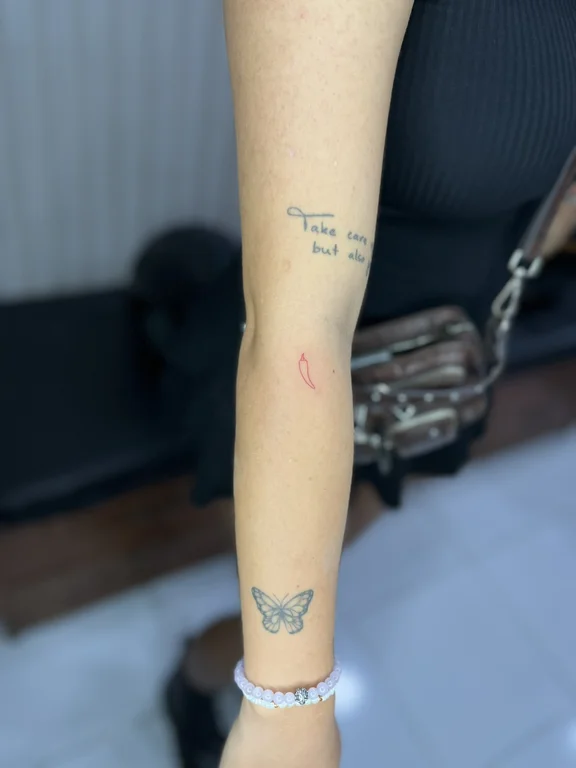 abstract minimalist butterfly fine line minimal spiritual elegant soft shading tattoo Canggu Bali